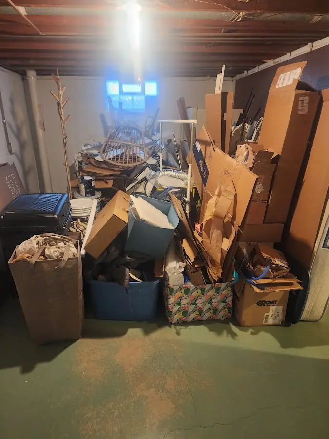 Roll-off dumpster container at job site for 2 Yard Dumpster Rental in Titusville